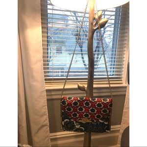 Aldo purse. Red and blue print with white flowers.